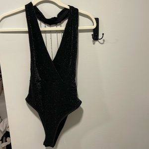 Black sparkly back lace chain bodysuit. Amazon size medium.